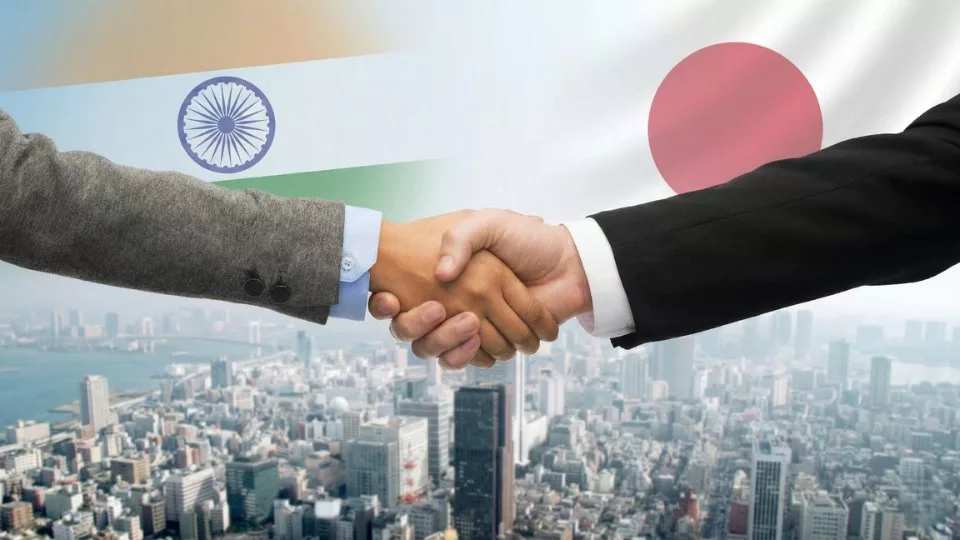 why japanese companies choose quantana handshake showing India–Japan partnership